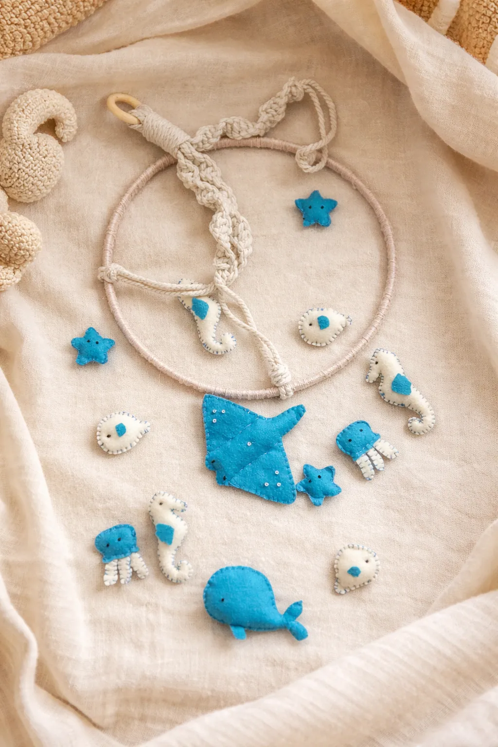 Felt sea animals laid out before assembly